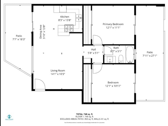 A floor plan of a house with a living room, kitchen, two bathrooms, and two bedrooms.