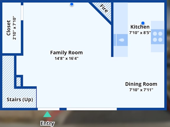 A blue and white floor plan of a house with a family room, kitchen, dining room, closet, and stairs.