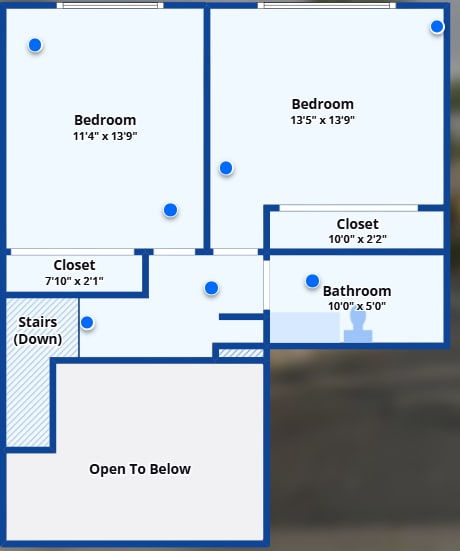 A blueprint shows the layout of a house with two bedrooms, a closet, a bathroom, and a staircase.