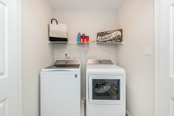 A laundry room with a washer and dryer.