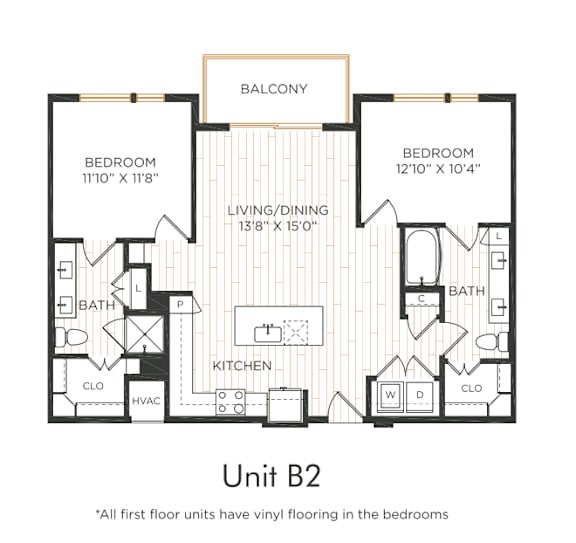 Two-bedroom apartment with entry into the kitchen featuring an island and adjacent living/dining area with balcony access. Split-bedroom layout with each bedroom offering direct bathroom access and nearby closet space. Primary bedroom includes dual vanities. In-unit washer and dryer included.