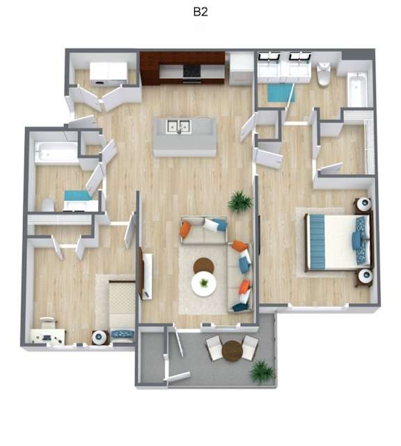 A top-down view of apartment B2 showing a living room, kitchen, and two bedrooms.