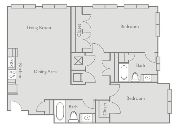 A floor plan of a house with a living room, dining area, kitchen, and two bedrooms.