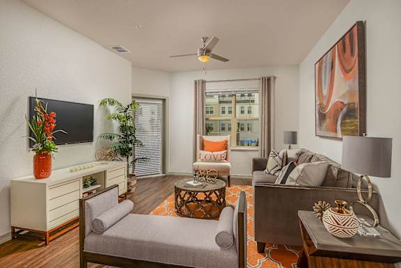From the entry is laundry closet and storage. Dining area next to open-concept kitchen and living area. Living next to balcony and bedroom with closet. Master bed has walk-in closet. Next to bathroom.