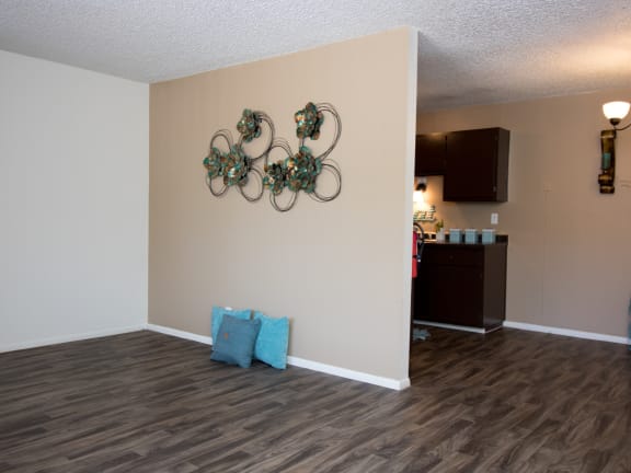 a photo of the living room and kitchen of a 560 square foot, 1 bedroom apartment at
