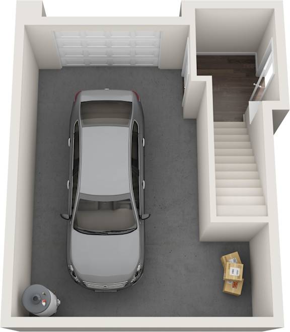 A car is parked in a garage with a roll of tape and a box of tissues on the floor.