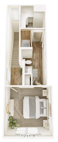 A floor plan of a small apartment with a bedroom, living room, and kitchen.