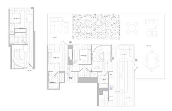 A floor plan of a house with a garage and a separate entrance.