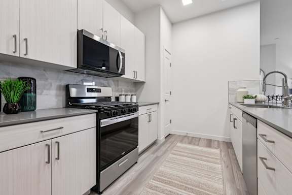 Kitchen With Microwave at Coya Apartments, Las Vegas, NV, 89102