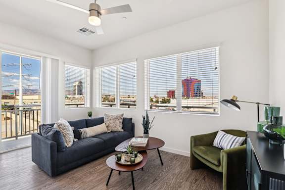 Living Room With Ceiling Fan at Lura Vegas Apartments, Las Vegas
