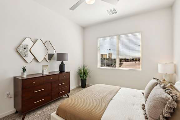 Bedroom With Expansive Window at Lura Vegas Apartments, Nevada