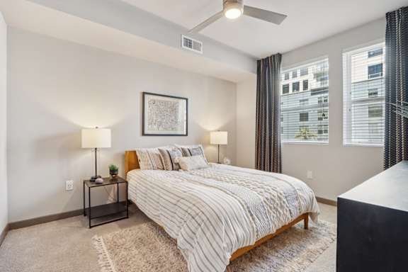 A Bedroom with a Window at The Rey Downtown Apartments, Phoenix, 85003