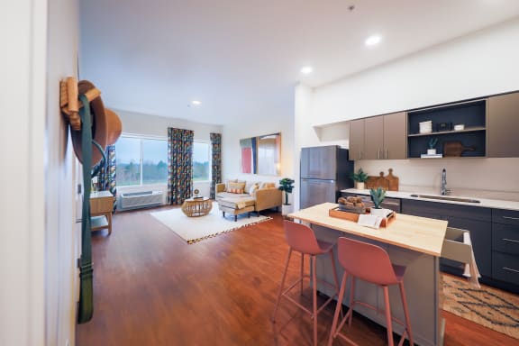 a kitchen and living room at Hana Apartments, Oregon, 97006