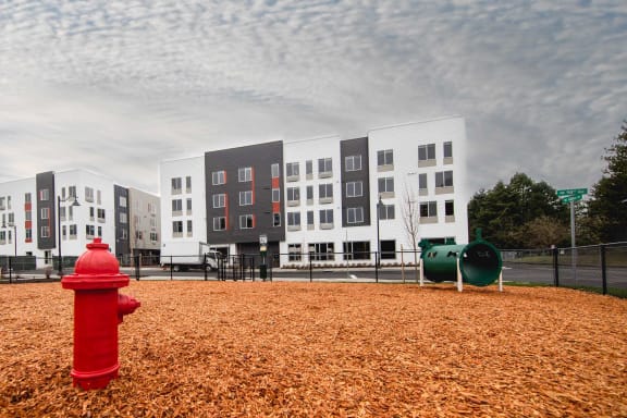 Red fire hydrant at Hana Apartments, Hillsboro