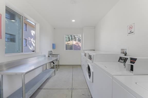 Laundry Room at Acclaim at Baldwin Apartments, Los Angeles, California