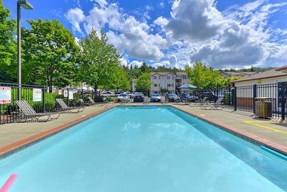 Relaxing Pool Area With Sundeck