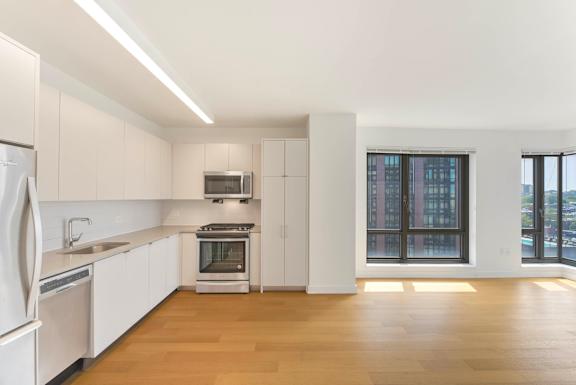 Kitchen with White Cabinets at 535 Carlton Ave Apartments, New York, 11238