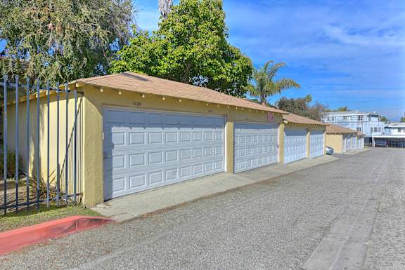 A row of garage doors are closed at Acclaim at Baldwin Apartments, California