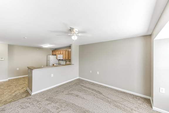 Spacious room with ceiling fan1 at Cameron Court, Detroit