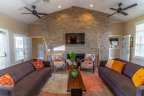 Community Room With Fireplace at Retreat at Valencia Apartment Homes, Orlando, FL 32825