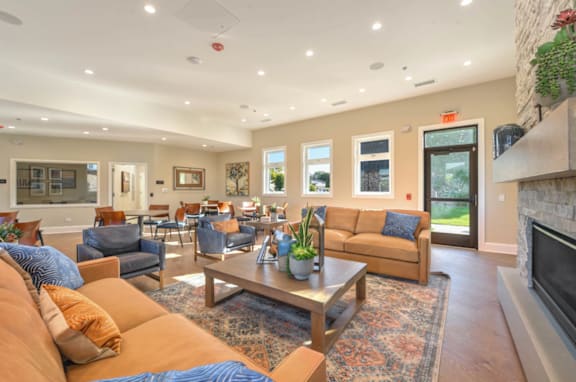 A living room with a fireplace and a couch.