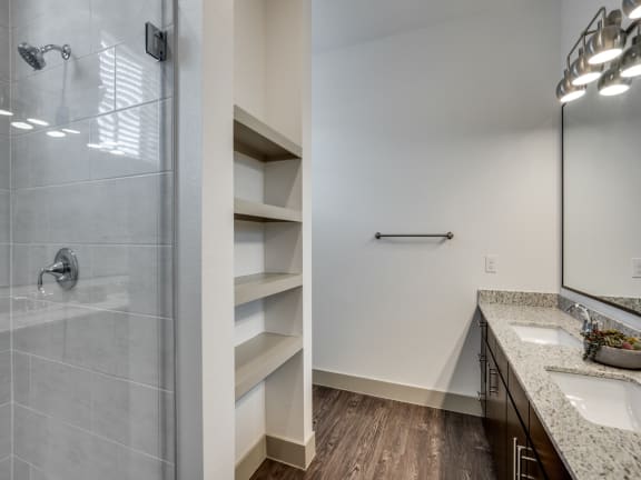the retreat apartments renovated bathroom with closet and shower