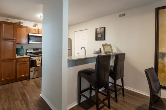 View of kitchen and dining at Altitude at Blue Ash, Blue Ash, OH