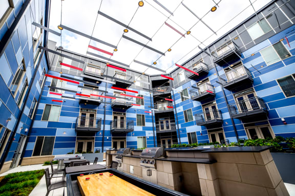 Outdoor Shuffle Board Overlooking At Property Exterior at The Congress at Library Square, Indianapolis