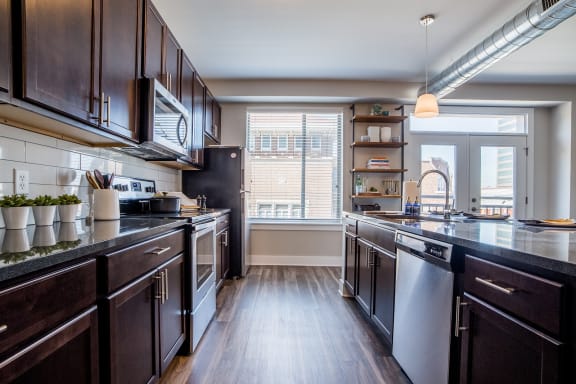 Modern Kitchen With Custom Cabinet at The Congress at Library Square, Indianapolis, Indiana