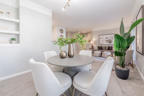 Dining Area With Living Room View at The Village on Spring Mill, Carmel, Indiana