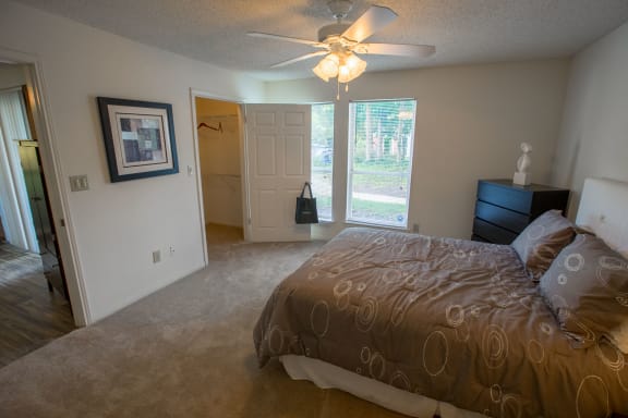 Bedroom With Expansive Windows at Residence at White River, Indianapolis, Indiana