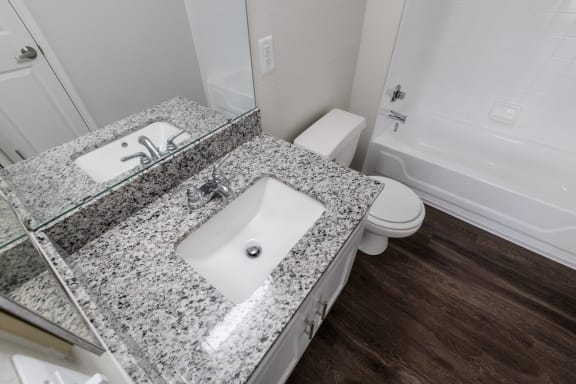 Renovated Bathrooms With Quartz Counters at The Residence at White River Apartments, Indiana, 46228