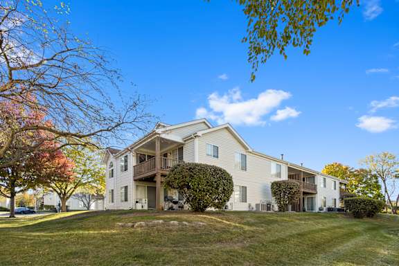 A building at The Winds at Poplar Creek showcasing patio and balconies at The Winds at Poplar Creek Apartments , Illinois 60194