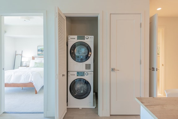 Washer and dryer near bedroom
