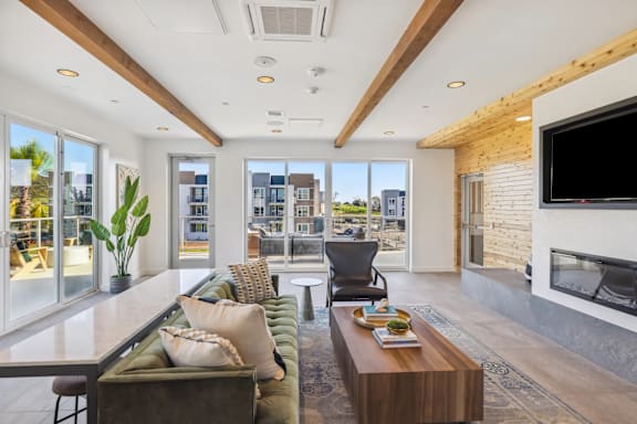 A modern living room with a fireplace and a view of the city at 38° NORTH, Santa Rosa, California