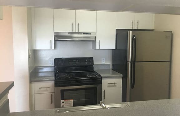 cabinetry and stainless steel appliances at The Edge at Town Center Apartments, Jacksonville, FL