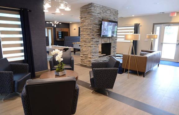 seating and tv at The Edge at Town Center Apartments, Jacksonville 32224