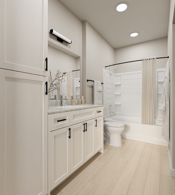 A white bathroom with a toilet and a shower at Ironwood Ranch, Maricopa, Arizona