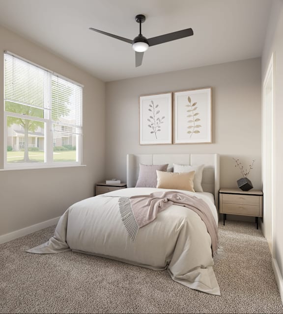 A bedroom with a large bed and a ceiling fanat Ironwood Ranch, Arizona
