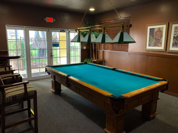 Laguna Pointe game room with pool table