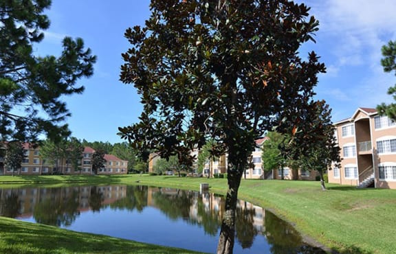 exterior with lake views at The Edge at Town Center Apartments, Florida, 32224