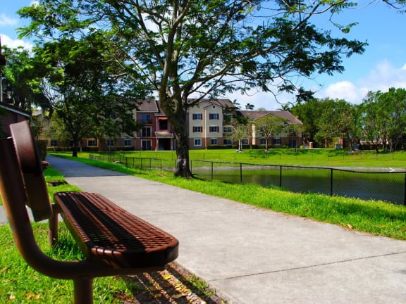 bench area overlooking lake at Sanctuary Cove, North Lauderdale, FL