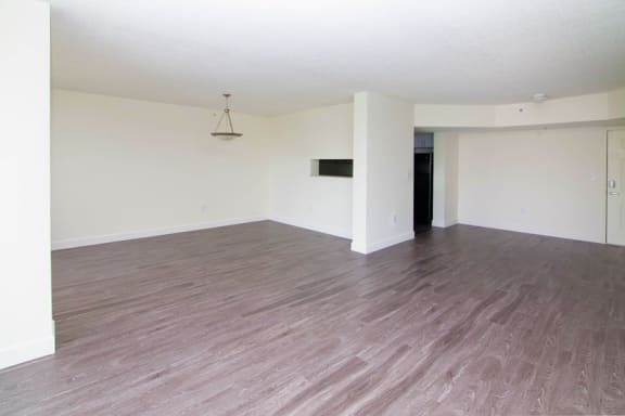 Living room and dining area near kitchen at Aqua 2800, Oakland Park