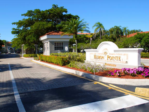 Monument sign at entry Heron Pointe Apartments Miramar Florida