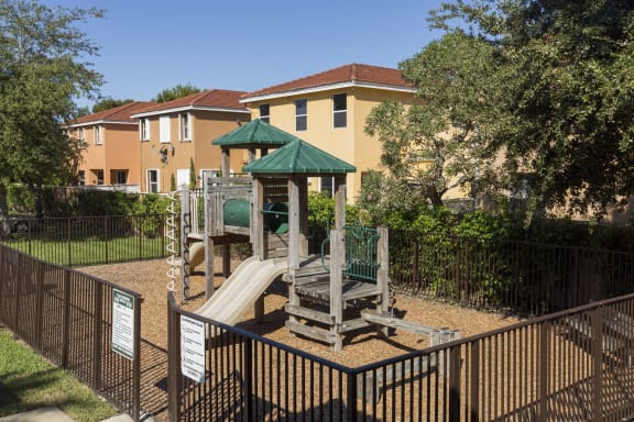 Fenced playground at Doral Terrace, Doral, 33178