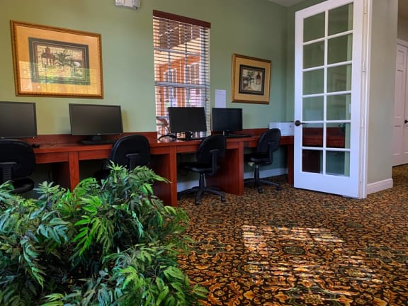 Portofino Apartments business center with computers at Portofino, Palm Springs