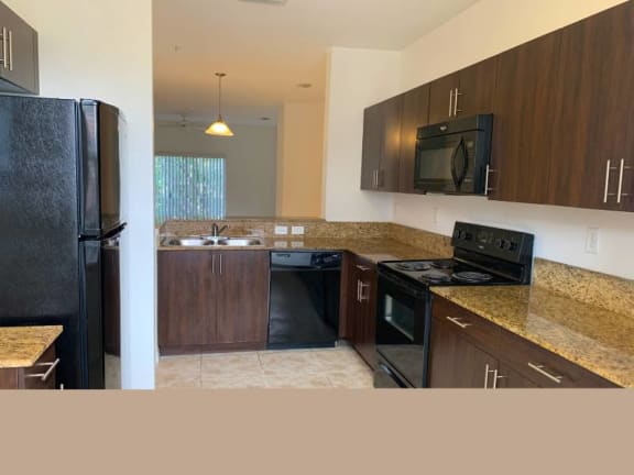 dark wood cabinetry at Preserve at Boynton Beach, Boynton Beach