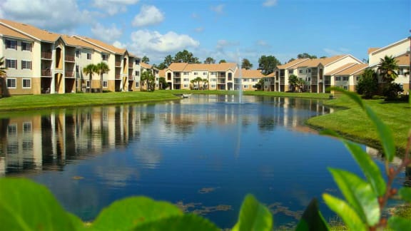 San Marco community exterior with lake at San Marco Apartments, Florida