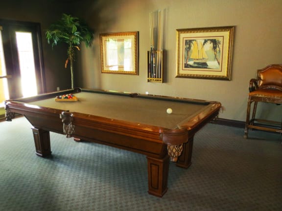 San Marco game room with pool table at San Marco Apartments, Ormond Beach, FL