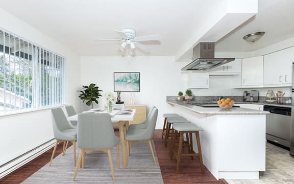 Dining area near kitchen with window  at Township Eastside, Portland, OR, 06489